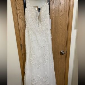 Wedding dress - brand new. Never worn.